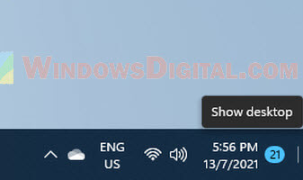 Hover or click on the far corner of taskbar to show the desktop Windows 11