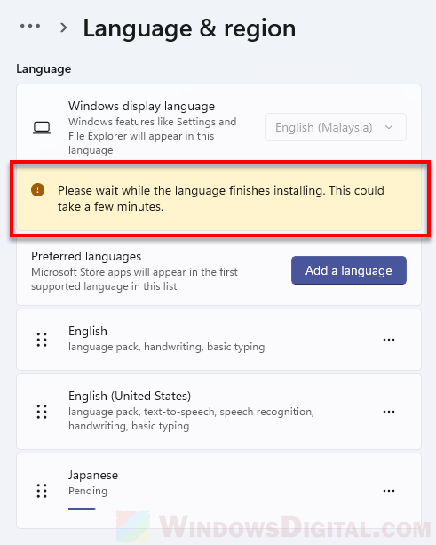 Please wait while the language finishes installing Windows 11